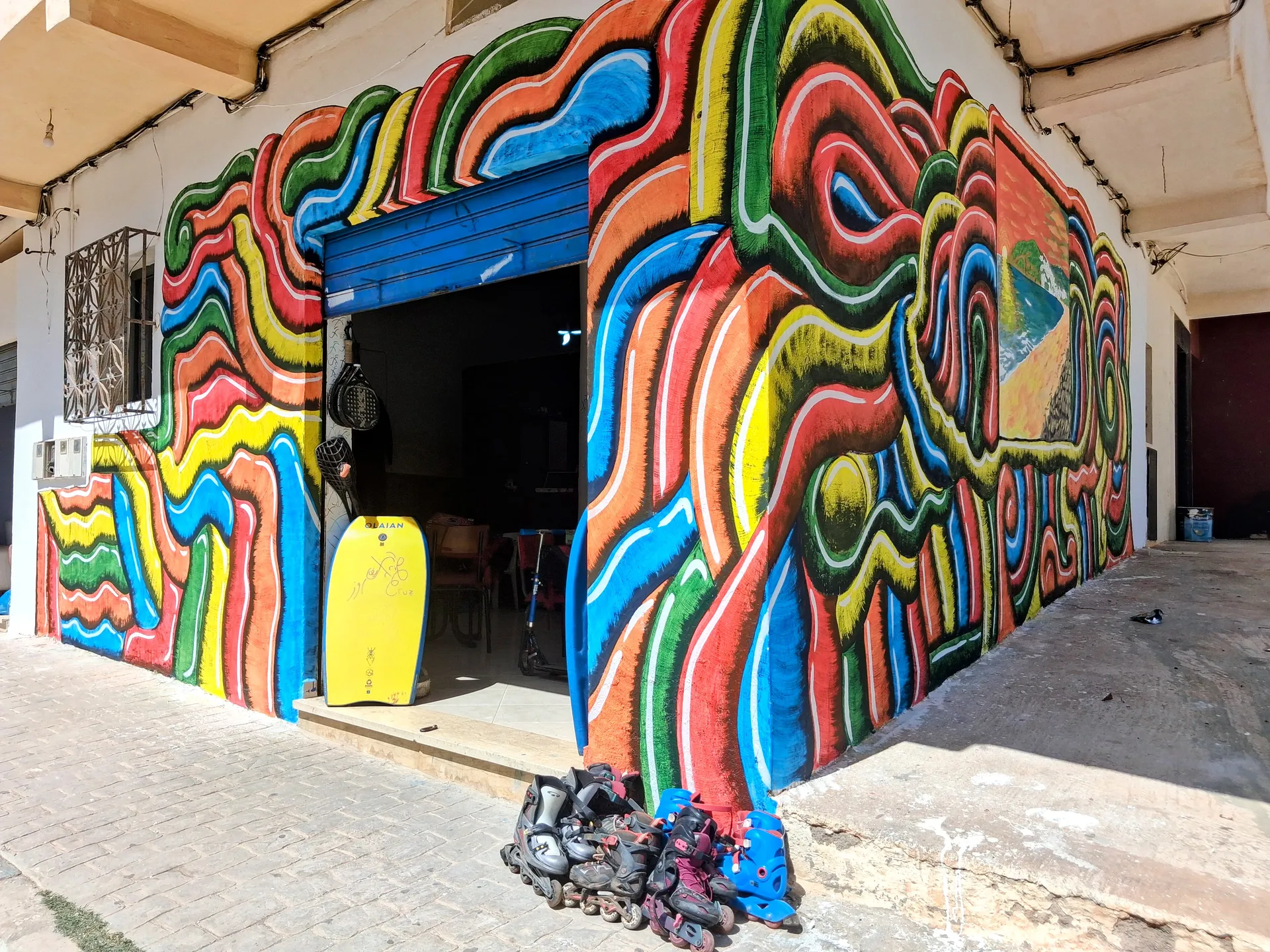 Colourful mural facade of Xrif Cruz in Azla, near Tetouan, Morocco